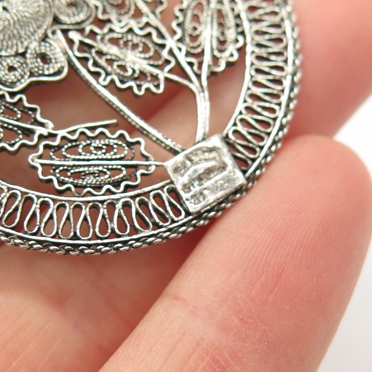 925 Sterling Silver Vintage Filigree Floral Eternal Curve Design Pin Brooch Weight: 6.2g WELCOME TO PAWN SHOP We are an actual pawn shop and have been in business for over 25 years. Since 1990, our establishment has been serving a variety of clients by providing them with short term cash solutions and options of liquidity regarding their treasured heirlooms. Acknowledging that today′s customers are very sophisticated and are looking for a variety of investments, our acquisitions are hand-picked Ornate Filigree Pendant Brooch, Silver Filigree Brooch For Anniversary, Ornate Round Brooch With Intricate Design, Ornate Round Brooches With Intricate Design, White Gold Brooches With Intricate Design As Gift, Ornate Brooches With Intricate Design As Gift, White Gold Brooches With Intricate Design For Gift, Gift White Gold Brooches With Intricate Design, Ornate Antique Silver Brooch As Gift