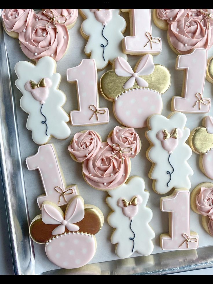 decorated cookies in the shape of numbers and teddy bears