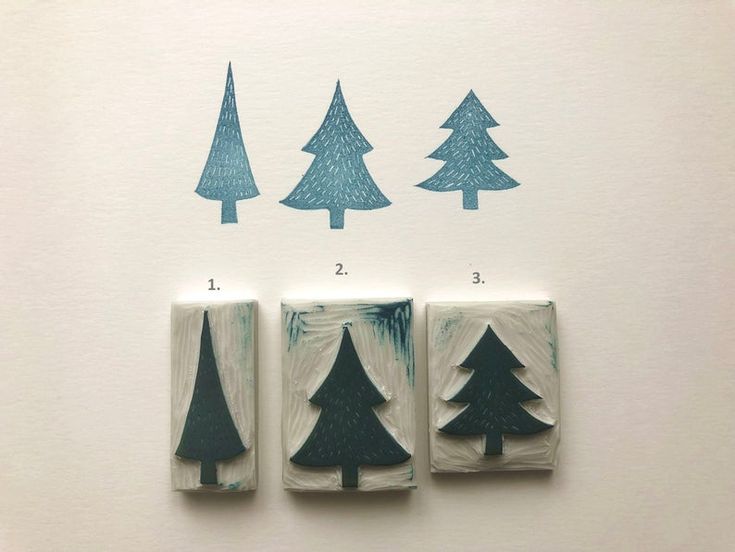 four different types of trees are shown in blue ink on a white paper with the numbers 1, 2, 3 and 4