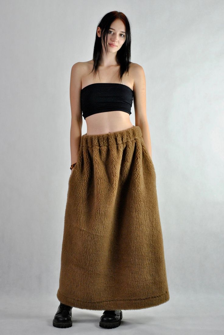 This is our no. 131 of Conscious Clothing Concept. This is a long maxi sheep's wool skirt that will keep you warm during the coming cold winter.  The pockets are placed in the side seams so you can keep your hands warm as well. It is the ultimate warm fabric for cold weather as it breathes and not allows body to sweat. Please be aware that this skirt will not look slimming :) Please write me a note if you would like any other colour from our fabric options, using a number or a name of a colour o Brown Maxi Skirt With Pockets For Fall, Brown Long Skirt Bottoms For Winter, Brown Long Skirt For Winter, Brown Lined Skirt For Winter, Brown Full-length Maxi Skirt For Fall, Fall Maxi Skirt With Pockets, Brown Full Length Maxi Skirt For Fall, Brown Flowy Maxi Skirt With Pockets, Fall Full Length Brown Maxi Skirt