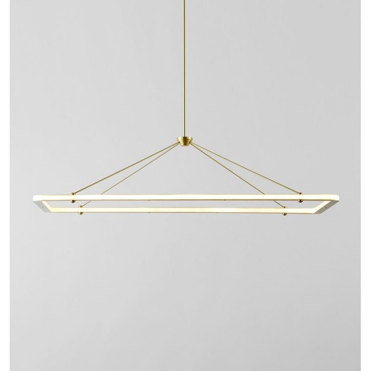 a modern light fixture hanging from the ceiling