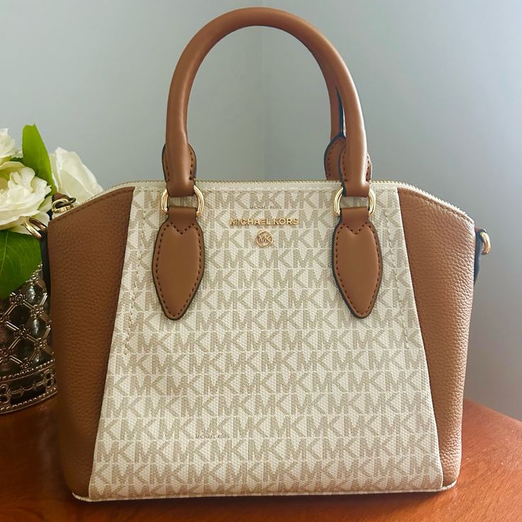 Michael Kors Signature Sienna Messenger Bag. Color Is Acorn/Vanilla, Retails For $278. Great Deal With Price!!! No Flaws And Still Has Tag Attached. Love This Purse I Just Want Something Bigger To Fit My Laptop In This Summer! Michael Kors Cream Shoulder Bag With Detachable Handle, Michael Kors Beige Leather Bag, Michael Kors Cream Bag With Detachable Handle, Luxury Michael Kors Beige Satchel, Luxury Beige Michael Kors Satchel, Michael Kors Beige Satchel With Removable Pouch, Michael Kors Beige Satchel With Detachable Handle, Michael Kors Beige Bag With Detachable Strap, Michael Kors Designer Beige Bag