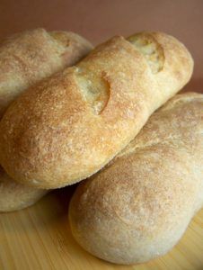 four round bread rolls stacked on top of each other