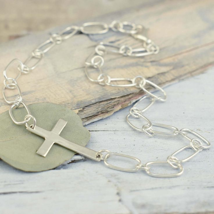 Our Forever Linked Necklace comes to you in handcrafted sterling silver in 16-inches.  If you prefer a longer length, you can select 18-inches for a small additional fee.  This designer silver necklace combines a simple link chain of varying lengths with a high polished cross placed off-center.  It is a perfect item for gift giving and gift keeping as a reminder of the one who made a way for us ~ forever.Be sure to check out the matching Forever Linked Bracelet to complete the look.Metal: .925 S Teal Rings, Unique Sterling Silver Jewelry, Forever Necklace, Us Forever, Linked Bracelet, Silver Necklace Simple, Gold Ring Stack, Christian Jewelry, Anklet Jewelry