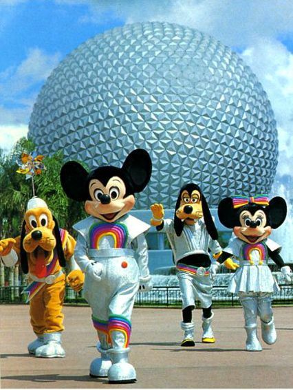 mickey mouse and other disney characters in front of the spaceship dome at epcoti