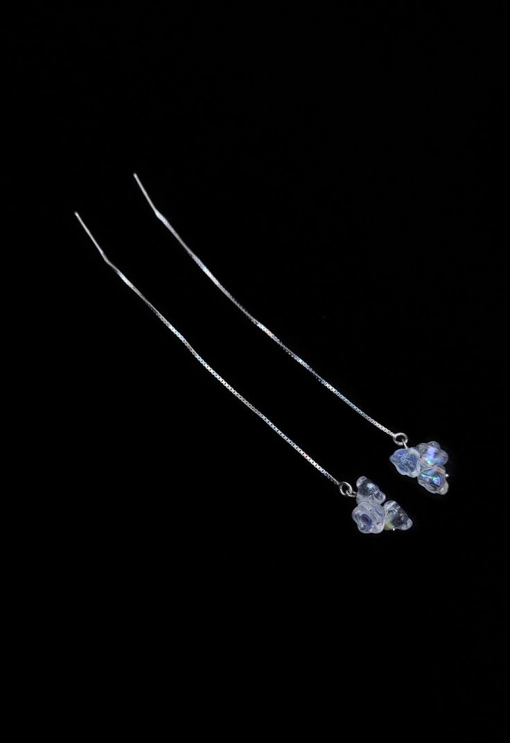 Silver pull through chain earrings with three small Czech glass flower beads.  Sterling silver floral threader earrings. These small transparent Czech  glass flowers have a beautiful, very elegant, iridescent shine to them.  The pull through chain is made of 925 sterling silver. Total length 11.5 cm Handmade in Atelier Jalalabad. * Most of our jewelry is old or antique and has not been polished to preserve its aged authenticity.  ** We ship world wide by registered mail which can be slow or choo Chain Threader Earrings, Silver Threader Earrings, Beads Earrings, Glass Flowers, Threader Earrings, Chain Earrings, Elegant Earrings, Small Flowers, Beaded Flowers