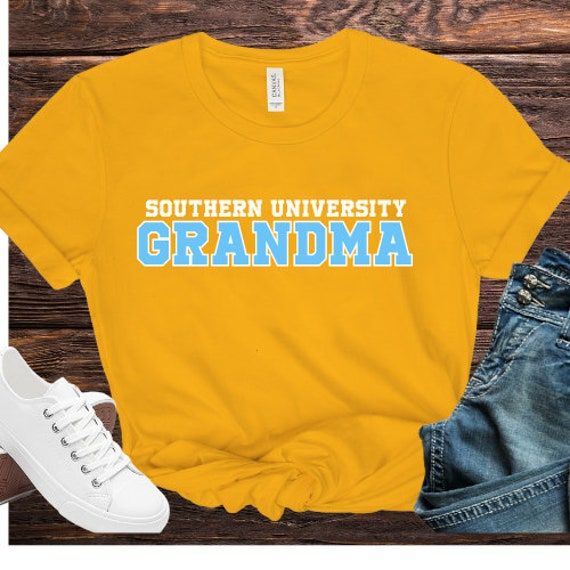 Show your Southern University pride with this stylish and comfortable Bella Canvas T-shirt! Perfect for the whole family, these shirts are available in sizes S-4x and features a classic fit that suits everyone. Whether you're a proud mom, dad, sister, brother, uncle, auntie, grandma, or grandpa, these shirts are a great way to represent your love for Southern University. Product Details: Brand: Bella Canvas Material: 100% combed and ringspun cotton for a soft, comfortable feel Fit: Unisex sizing Cotton T-shirt For Game Day And Father's Day, Cotton T-shirt For Game Day On Father's Day, Casual Tops For Game Day On Father's Day, Casual Yellow T-shirt With Team Name, Cotton T-shirt With Team Name For Father's Day, Father's Day Cotton T-shirt With Team Name, Casual T-shirt For Game Day On Father's Day, Casual T-shirt For Game Day, Cotton Tops With Name Print For Family Reunion