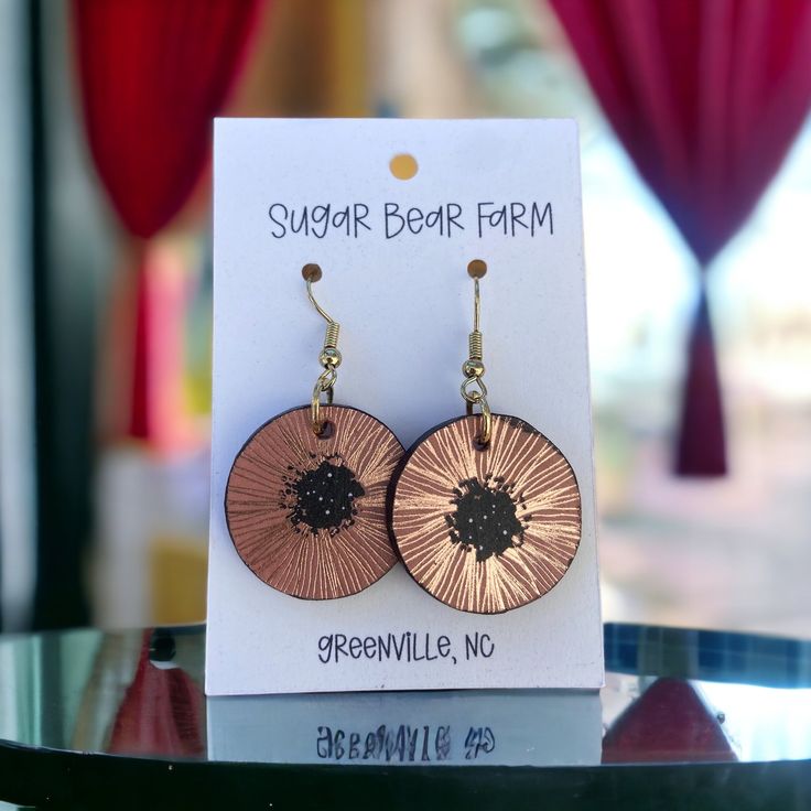 Variety of flower themed earrings. Earrings are 1 inch in diameter plus the ear-wire. Earrings are handmade and made-to-order so your design may vary a little bit but I do my best to make sure what you see in the photo is an accurate depiction of what you will receive. *Iron Ear-wire*