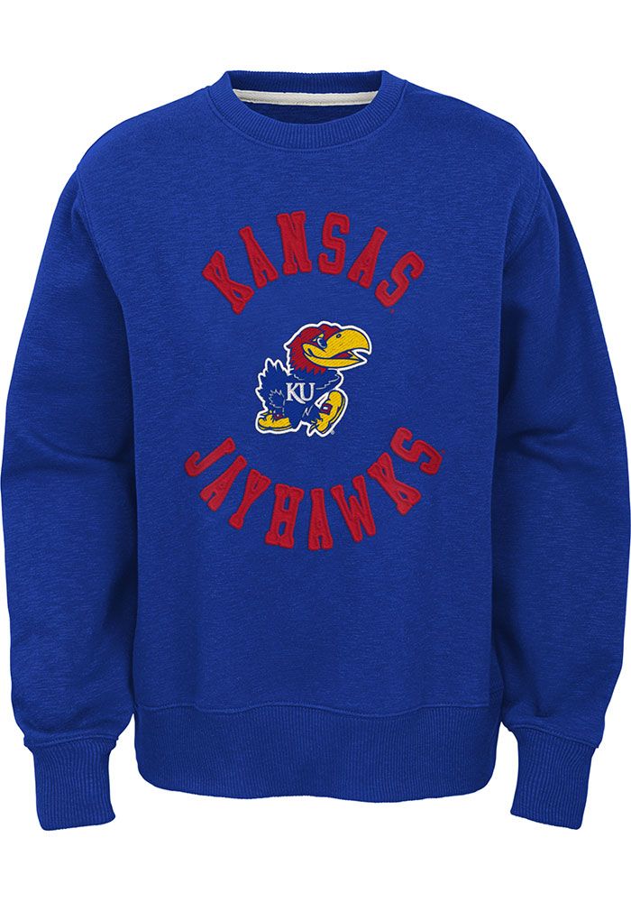 Let your little fan feel like one of the team in this Kansas Jayhawks Youth Blue The Come Back Crew Sweatshirt! They'll love showing off their pride in this KU Jayhawks Jayhawks Crew Neck Shirt, which features a direct embroidery team graphic on center chest. Cotton Throwback Sweatshirt For Fan Gear, Cotton Throwback Fan Gear Sweatshirt, Team-colored Throwback Cotton Sweatshirt, Blue Collegiate Pre-shrunk Sweatshirt, Blue Fleece Fan Merchandise Sweatshirt, Collegiate Blue Pre-shrunk Sweatshirt, Blue Throwback Sweatshirt For Game Day, Throwback Blue Sweatshirt For Game Day, Casual Sweatshirt With Embroidered Graphics For Fans