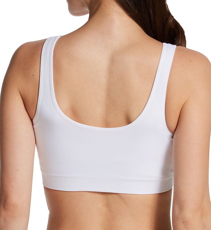 Convenient and comfortable seamless bra has knit-in support with an allover flexing design that's comfortable enough to sleep in. Wireless, seamless stretchy molded cup expands and contracts in all directions for a unique supportive fit. 4-way stretch fabric for incredible adaptive stretch that doesn't bind or shift. Cup is lined with same fabric to create a pocket that allows you to insert removable padding or a breast form, not included. Front hook-and-eye closure has a plush backing panel for Sports Bra With Micro-elastic Fit And Soft Touch, Sports Bra With Soft Touch And Micro-elastic Fit, Sports Bra With Micro-elastic Soft Touch, White Seamless Micro-elastic Bra, Supportive Seamless White Nursing Bra, White Stretch Sports Bra With Soft Touch, Sporty Bra With Soft Touch, White Sports Bra With Soft Touch, White Seamless Sports Bra For Yoga