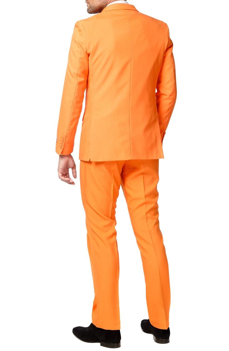 Formal style doesn't have to be rigid and boring. Make it fun with this bright orange two-piece suit and go against the grain with fresh, bold personality. Tailored for a modern fit, it includes a two-button suit jacket and trousers cleanly styled with tonal buttons and stitching, as well as a matching tie to pull the whole outfit together. Jacket has a two-button closure, notch lapels; nonfunctional four-button cuffs; chest pocket; front flap pockets; side vents. Trousers have a zip fly with bu Orange Two Piece, Orange Suit, Against The Grain, Suit Tie, 2 Piece Suit, Kings Day, Party Suits, Orange Is The New, Orange Is The New Black