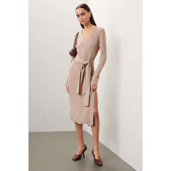 Beige knit (70% Wool, 30% Cashmere). A-line. Long sleeves. V-neck. Tie closure. 47" from shoulder to hemline. Imported. Beige Knit V-neck Midi Dress, Fitted V-neck Maxi Dress For Daywear, Spring Fitted V-neck Sweater Dress, Fitted V-neck Sweater Dress For Spring, Spring V-neck Fitted Sweater Dress, Chic V-neck Dress For Fall Daywear, Elegant V-neck Midi Dress For Fall, Fitted V-neck Midi Dress For Daywear, Chic Knee-length V-neck Winter Dress