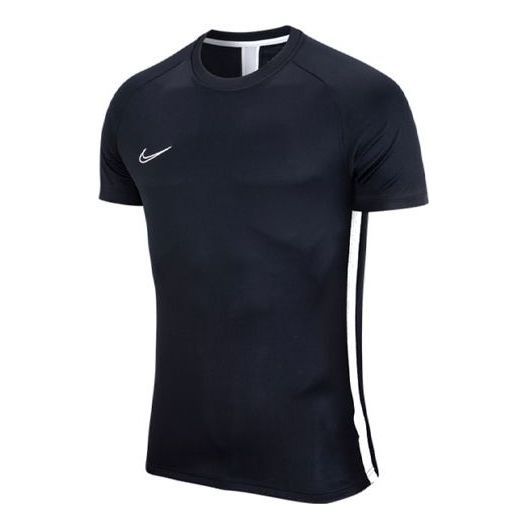 a black shirt with white stripes on the side and a nike logo on the chest