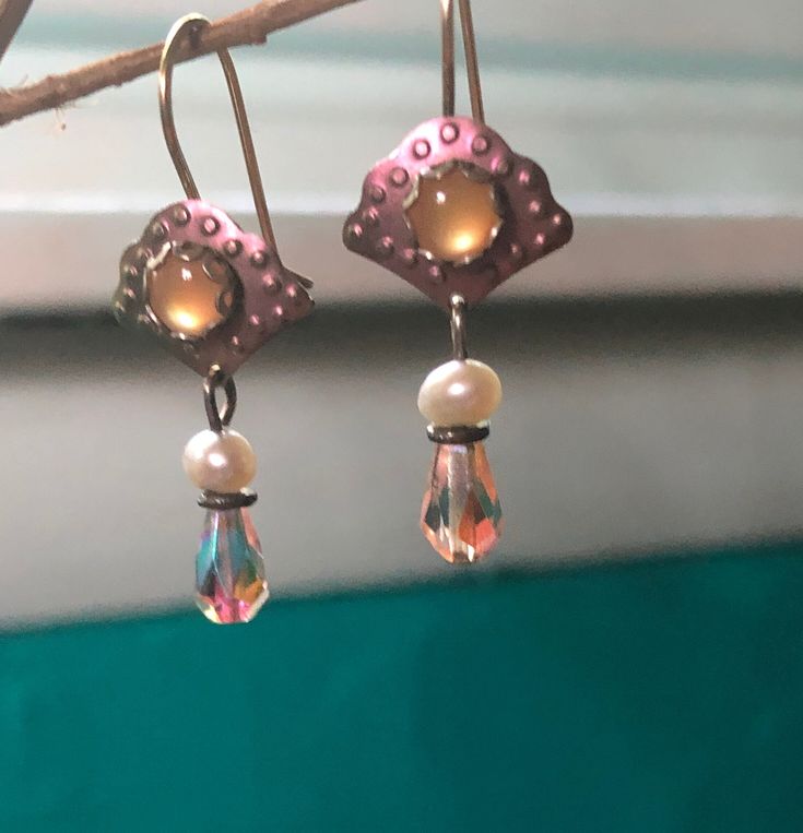 I am offering a dainty pair of 1990s earrings. These dangle and drop earrings are so pink with a pearl and pink crystal drop. Pink Teardrop Pearl Drop Earrings, Pink Pearl Drop Teardrop Earrings, Pink Dangle Pearl Earrings, Pink Pearl Drop Dangle Earrings, Pink Dangle Pearl Earrings With Ear Wire, Pink Dangle Pearl Earrings For Pierced Ears, Single Pink Crystal Drop Earrings, Pink Teardrop Earring, Pink Drop Earrings With Ear Wire