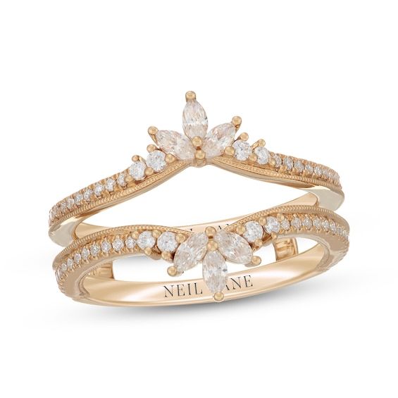 a gold ring with white stones on top and the words,'love is in the air