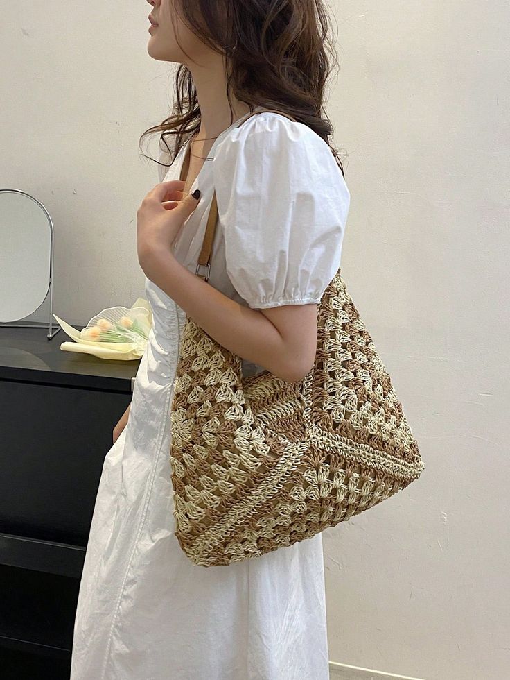 This chic and stylish large capacity Boho woven straw shoulder bag is the perfect tote for teen girls on the go! With its unique design and spacious interior, this bag is both fashionable and functional. Stay organized and look fabulous with this must-have accessory. Color : Khaki Bag Size : Medium Type : Straw Bag Pattern Type : Colorblock Pattern Type : Tribal Material : Straw Size Bag Height Bag Length Bag Width Handle Height one-size 30 35 1 28 Trendy Braided Beige Crochet Bag, Trendy Beige Crochet Bag, Beige Braided Crochet Bag, Casual Braided Crochet Bucket Bag, Trendy Beige Handheld Crochet Bag, Trendy Beige Straw Shoulder Bag, Casual Braided Bucket Crochet Bag, Trendy Straw Bucket Bag With Large Capacity, Trendy Brown Beach Shoulder Bag