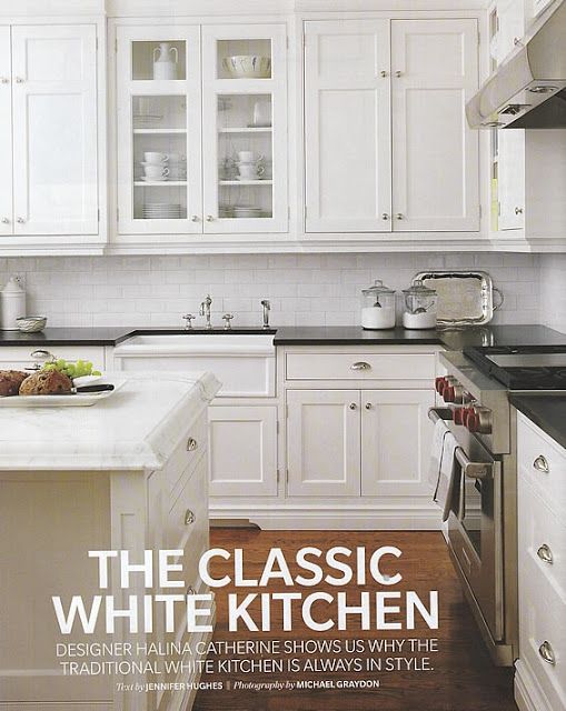 a kitchen with white cabinets and black counter tops is featured on the cover of this magazine