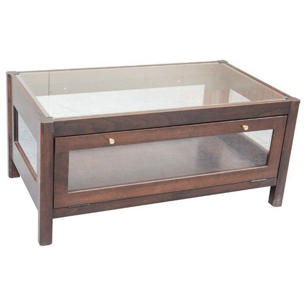 a wooden and glass coffee table with drawers