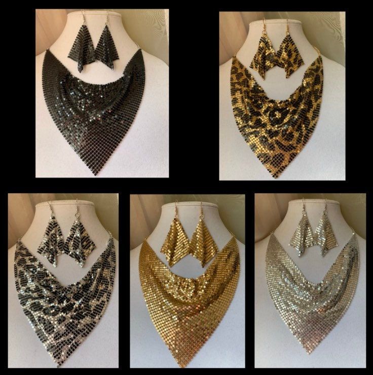 This trendy jewelry set comes in 5 different styles. Black, Gold, Silver, black and gold, silver and black The bib necklace is about 22inches. The bib is 11x5 1/2inches The earrings are about 3 1/2 inches The earrings pendant is about 2 7/8 x 2 7/8 inches If you have any questions please don't hesitate to ask Black Jewelry Set, Silver Braces, African Inspired Earrings, African Inspired Jewelry, Earrings Sets, Chain Diamond, Hand Painted Earrings, Black Jewelry, Earrings Black