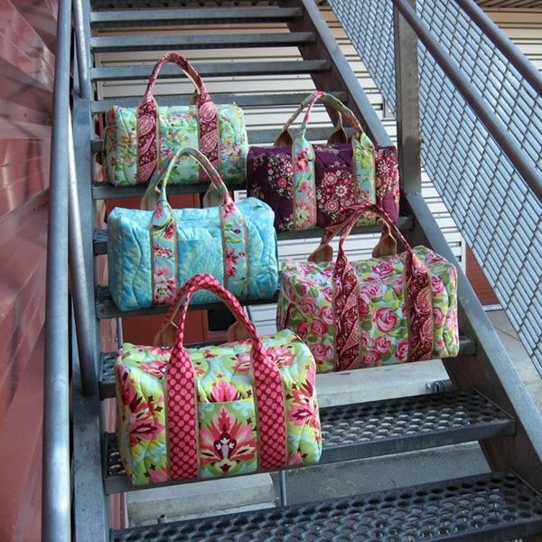 many bags are lined up on the steps