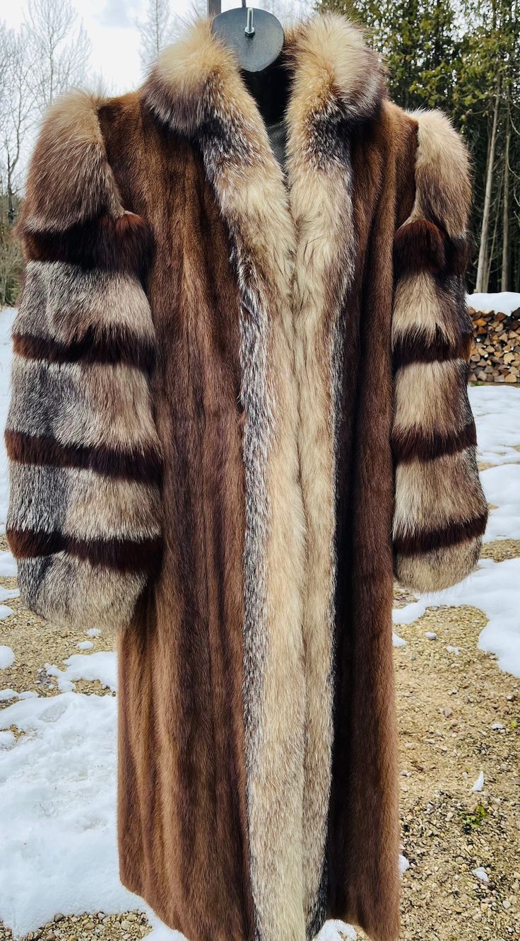 "This vintage deluxe Paul Magder made in Canada caramel mink with arctic fox fur sleeves and trim coat lined with hook closure and pockets is slightly used in good condition. The fur is thick and full, no thinning and no damages Size & Measurements: Based on measurements and fit this coat is a size Large Chest Width: 22\" inches Back Width 22\" inches Shoulder Width: 16\" inches Height 48.5\" inches Arm Lengths 27\" inches Wrist Cuffs 5.5\" inches across This vintage fur jacket Is clean, eco fri Vintage Fur Jacket, Vintage Mink-colored Formal Outerwear, Fur Sleeves, Vintage Long Sleeve Mink Outerwear, Mink Coats, Vintage Brown Fur Coat With Pockets, Mink Jacket, Fox Coat, Long Mink-colored Faux Fur Coat