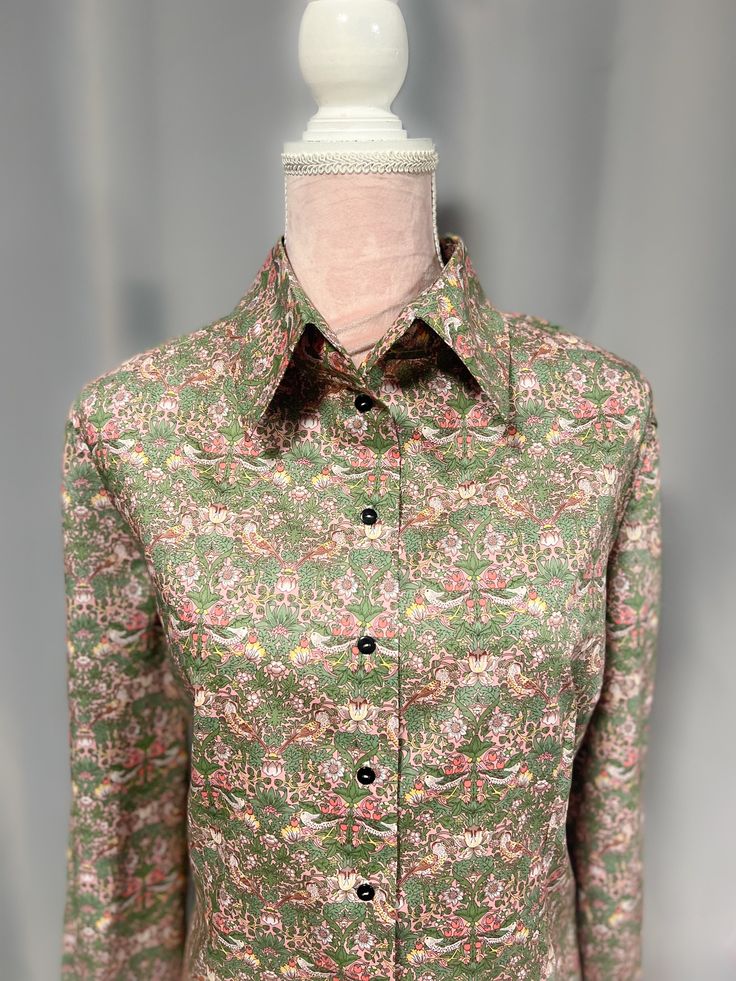 Liberty print woman's shirt 100% cotton Buttons I will process the order within 3-5 days Returns:  I'm unable to accept returns I'm afraid, however I am more than happy to answer all of your questions prior to your purchase. Please feel free to message me. Green Silk Button-up Blouse, Printed Button-up Office Shirt, Silk Button-up Shirt With Floral Print, Long Sleeve Floral Print Shirt For Daywear, Green Silk Collared Shirt, Printed Silk Button-up Shirt, Green Floral Print Long Sleeve Shirt, Green Blouse With Button Cuffs And Spread Collar, Elegant Printed Green Shirt