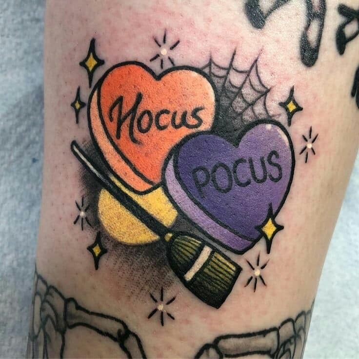 a couple of heart shaped candies on top of each other with the word hoccus