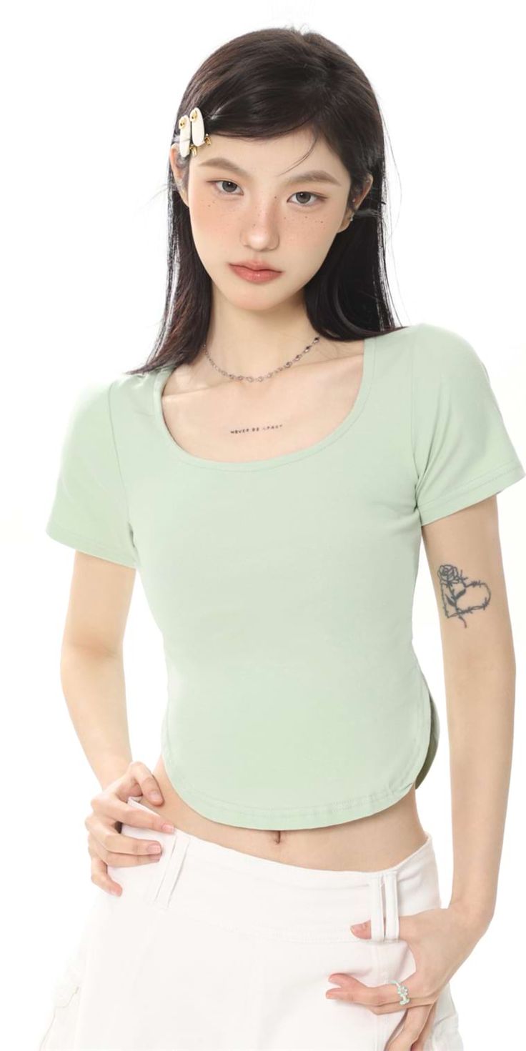 Show off your style with this Cropped U-Neck Curve Hem Baby Tee. It features a comfortable fit and short sleeves for a relaxed look. Wear it alone for a casual look, or layer it under any outfit. Pair it with your favorite skirt or pants for a variety of looks.
Gender: WomenMaterial: PolyesterClothing Length: ShortSleeve Length: Short SleevesSleeve Type: RegularCollar: Square Collar Summer T-shirt With Scoop Neck In Solid Color, Trendy Stretch Short Sleeve Bodysuit, Fitted Summer T-shirt In Solid Color, Green Scoop Neck T-shirt For Everyday, Fitted Short Sleeve T-shirt For Loungewear, Trendy Fitted Short Sleeve Bodysuit With Crew Neck, Trendy Fitted Crew Neck Short Sleeve Bodysuit, Trendy Fitted Short Sleeve Crew Neck Bodysuit, Stretch Solid Color Short Sleeve Top