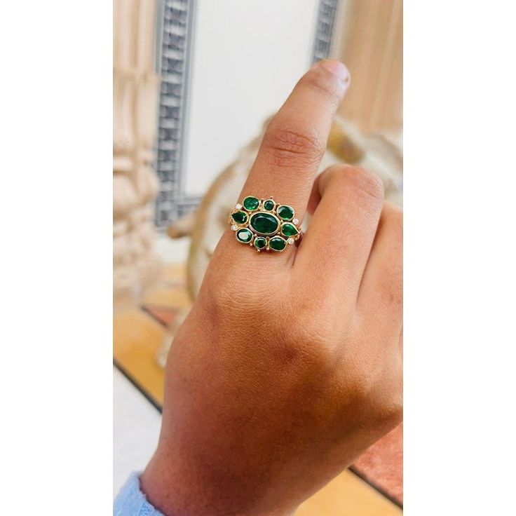 This is part of Chairish’s Fine Jewelry assortment.  Emerald ring in 14K Gold which perfectly goes with your personality and also helps you to improve your creativity. Designed with emeralds and diamonds that makes it a perfect fit to wear it on your wedding, occasions or style it with any of your basic outfit to give it a glam. This gorgeous ring is a great bridesmaid, wedding or christmas gift for anyone on your list.  PRODUCT DETAILS :-  Material - 14K Solid Yellow Gold Gemstone - Emerald Gem Emerald Cut Green Ring With Rose Cut Diamonds, Green Emerald Ring With Rose Cut Diamonds For Anniversary, Anniversary Green Emerald Ring With Rose Cut Diamonds, Green Cluster Ring With Rose Cut Diamonds, Green Emerald Cluster Ring With Rose Cut Diamonds, Green Emerald Jewelry With Rose Cut Diamonds, Luxury Green Emerald Ring With Rose Cut Diamonds, Luxury Emerald Birthstone Ring For Promise, Green Emerald Cut Diamond Ring With Rose Cut Diamonds