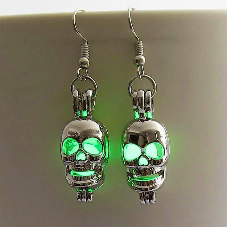 Brand New In Original Packaging Cute Little Pair Of Glow In The Dark Earrings For Some Night Time Fun! Measures 1.14”X.47” This Is Truly Unique Earrings With Skull Shape And Glow In The Dark Bead Inside. These Glow In The Dark Products Glow Out Light Only After They Absorbed Enough Light. So Please Make Sure That You Have Put These Glow In The Dark Products Under The Light To Absorb Light Before You Enjoy Their Light In The Dark. The Longer They Are Exposed, The Stronger They Glow. Luminous Silver Jewelry For Party, Silver Skull Jewelry For Halloween, Skull Shaped Silver Jewelry For Halloween, Nickel-free Skull Jewelry For Party, Silver Skull Earrings For Halloween, Glow In The Dark Earrings, Dark Earrings, Skull Shape, Earrings Skull