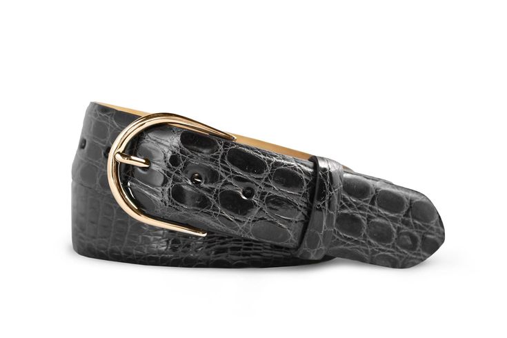 The refined design of our glazed Tingas crocodile belt pairs perfectly with polished looks from day to evening. Smooth nubuck leather lining. 1 1/2" wide.  Glazed Tingas crocodile belt with gold crescent buckle Convenient snaps to change the buckle Made in America Crocodile Belt, Alligator Belt, American Alligator, Golf Belt, Woven Belt, Nubuck Leather, Made In America, Small Leather Goods, Polished Look