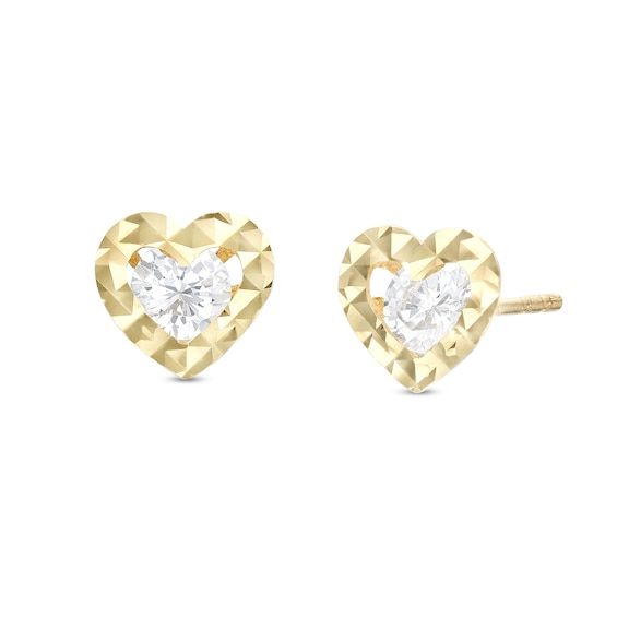 Just the right amount of light-catching shine! This CZ heart studs have us heart eyed. Made in responsibly sourced 10K solid yellow gold for everyday wear. Stone: Cubic Zirconia Stone Size: 3.5 mm Height: 5.74 mm Width: 6.27 mm 14k Gold Diamond Cut Heart Earrings, 14k Gold Heart-shaped Diamond Cut Earrings, Gold 14k Heart Earrings With Prong Setting, Gold Heart Earrings With Prong Setting In 14k Gold, 14k Gold Heart Earrings With Diamond Cut, Heart Shaped Yellow Gold Diamond Cut Earrings, Yellow Gold Heart Earrings With Brilliant Cut For Anniversary, Yellow Gold Heart Earrings With Diamond Cut, Yellow Gold Brilliant Cut Heart Earrings For Anniversary