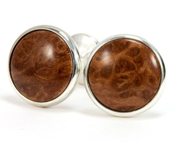 The deep red-brown color and figure of California redwood burl is irresistible in these wooden cufflinks. These redwood burl wood cufflinks are a perfect gift for that special occasion: wedding, father of the bride, best man’s gift, groom, groomsman, 5th anniversary, father’s day, graduation.► Silver fixed back, formal styling, easy on and off► 3/4" (18 mm) diameter cufflinks ► Natural wood color with durable gloss finish► Free elegant gift box included for easy gift giving► Wedding parties are Wedding Father Of The Bride, Wooden Tie, Redwood Burl, Anniversary Gift For Husband, Wedding Cufflinks, Wood Wedding, Burl Wood, 5th Anniversary, Anniversary Gifts For Husband