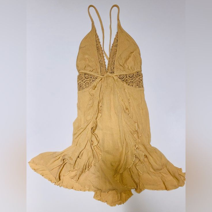 Free People Yellow Flowy Ruffle Mini Dress Size Xs Tp Nwt Yellow Flowy Dress For Beach Cover-up, Yellow V-neck Beach Dress For Spring, Yellow V-neck Mini Dress For Beach Season, Yellow Sleeveless Beach Cover-up Dress, Sleeveless Ruffled Mini Dress For Beach Cover-up, Yellow Flowy Beachwear Dress, Yellow V-neck Beach Dress Cover-up, Yellow Ruffle Beach Dress, Yellow Ruffled Beach Dress