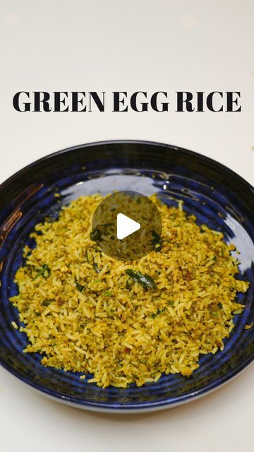 green egg rice in a blue bowl on a white table with text overlay that reads, green egg rice