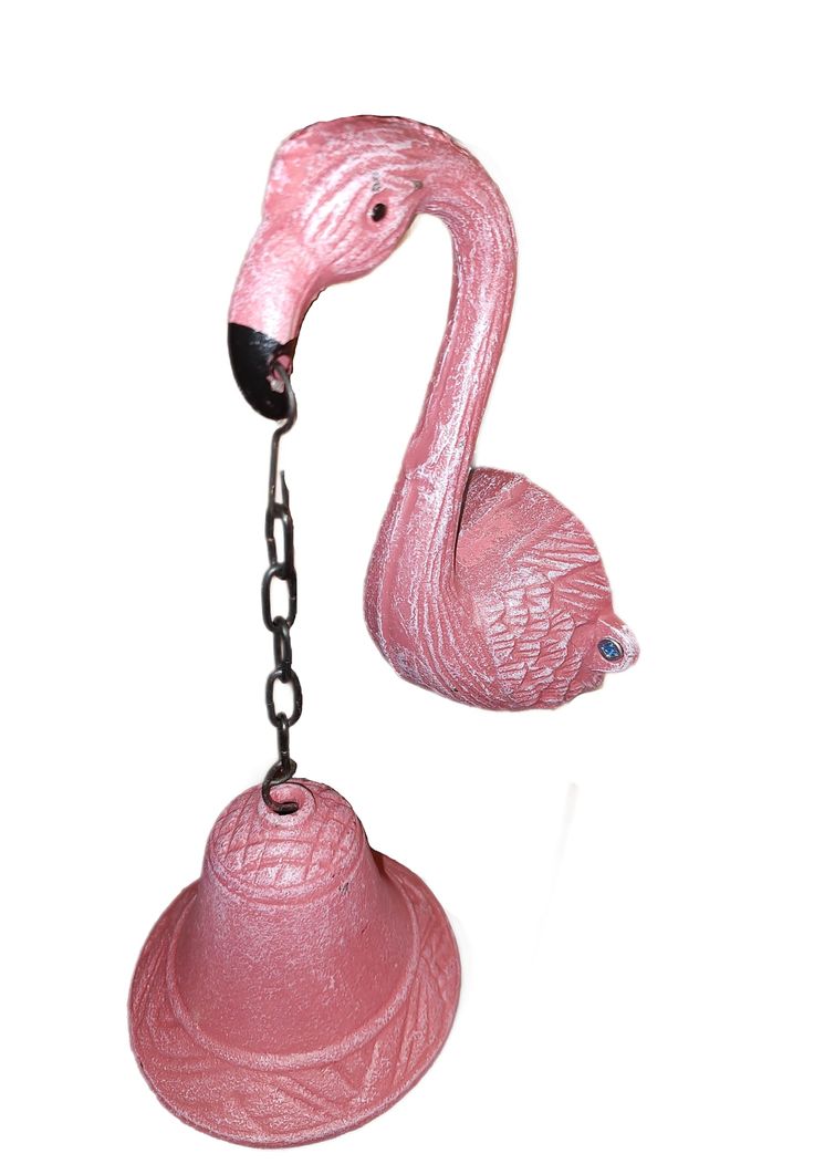 two pink flamingos hanging from chains on a white background