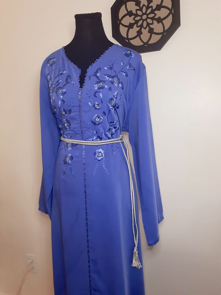 Top quality blue Moroccan kaftan, in silk crepe with embroidery and beading. This caftan is ideal for family occasions such as family celebrations, the month of Ramadan, Aid, or weddings. Several sizes available. Please contact us for more information. Top quality blue caftan, in silk crepe. This caftan is ideal for family occasions such as family celebrations, the month of Ramadan, aid, or weddings. Several sizes available. Contact us for more information. Blue Caftan, Month Of Ramadan, Moroccan Kaftan, Moroccan Caftan, Family Celebrations, Silk Crepe, Black Silk, Dress Clothes For Women, Ramadan