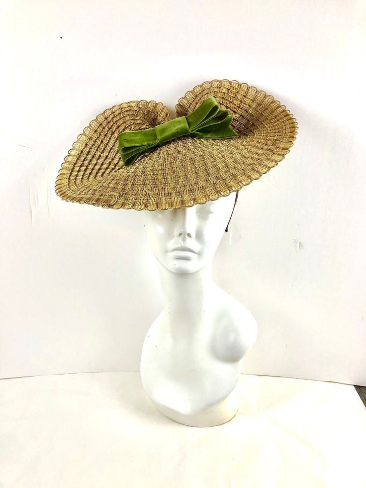 Ladies lunch hat- Tea party -Mad hatter- Derby day- Vintage style Hello, This fascinator is perfect for a cocktail party, Easter, ladies luncheon, or derby party. This has a double swiss velvet bow that is 2 wide and 7 inch long. This touch makes it look vintage. The straw is 15 inches wide. It's all on a skinny wearable headband. Velvet colors: olive (shown) navy black brown Great quality, light weight and fits the head very well. Very comfortable. ------------------------------------------- I Formal Straw Hat For Spring, Formal Spring Straw Hat, Spring Formal Cloche Mini Hat, Formal Spring Cloche Mini Hat, Spring Formal Mini Cloche Hat, Fitted Brimmed Straw Hat For Garden Party, Brimmed Fascinator For Spring Garden Party, Vintage Brimmed Party Costume Hats, Vintage Brimmed Top Hat For Party