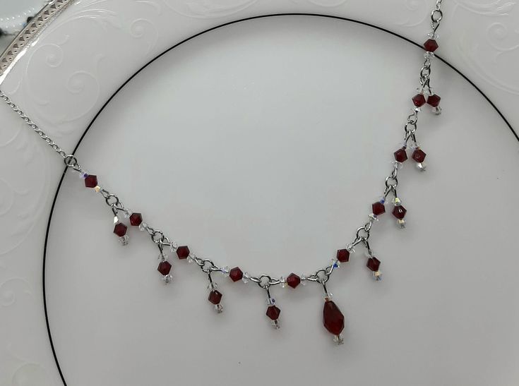 This gorgeous necklace is made with Swarovski Crystals and is designed to catch the light with every movement. Available in Red/White or Red/Black Goth Heart Necklace, Red Black Beaded Necklace, Black Dress Red Jewelry, Wire Jewellery Necklaces, Black And Red Necklace, Red And Black Necklace, Red Crystal Necklace, Punk Necklace, Formal Jewelry