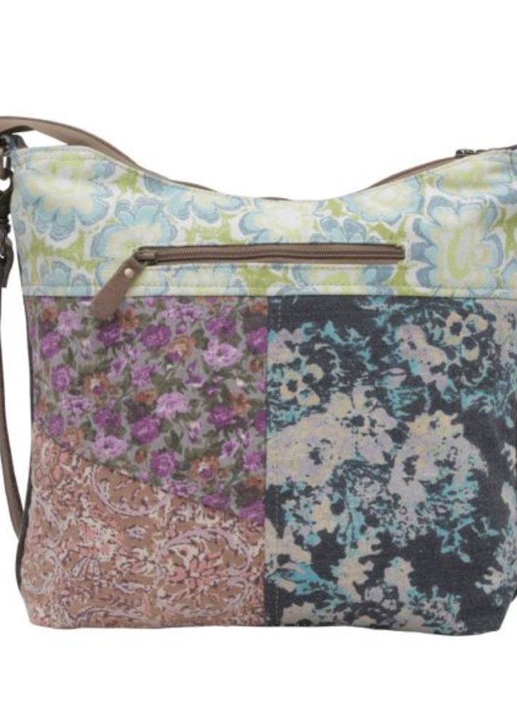 A perfect blend of style, functionality, and durability, this bag is designed for the modern woman on the go. The unique patchwork design combines vibrant floral prints on canvas with high-quality leather accents, creating an eye-catching piece that adds a splash of color and elegance to any outfit. The exterior of the bag boasts three convenient zipper pockets (one on the back and two on the front), ensuring your essentials are secure yet easily accessible. The full zip-top closure further secu Multicolor Canvas Shoulder Bag For Spring, Trendy Floral Print Travel Shoulder Bag, Patchwork Hobo Shoulder Bag, Floral Print Canvas Tote Shoulder Bag, Trendy Multicolor Canvas Bags, Patchwork Hobo Bag For Everyday Use, Multicolor Canvas Shoulder Bag With Zipper Closure, Trendy Travel Bag With Floral Print, Casual Canvas Bag With Floral Print