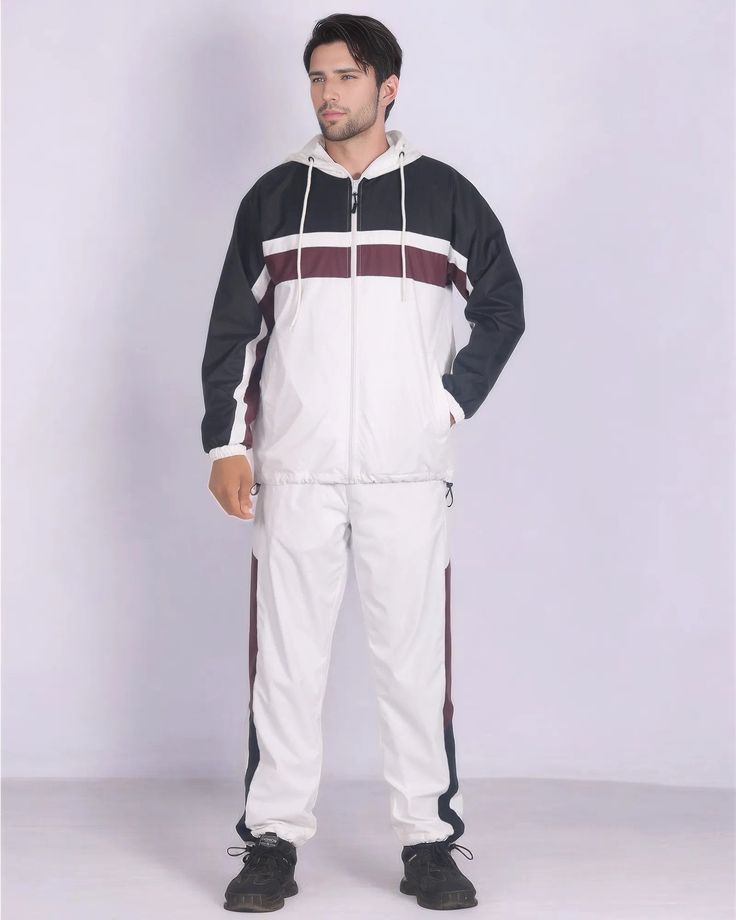 The Ridge windbreaker tracksuit is featured in a three tone color combination as a matching 2-piece outfit. The soft mesh lining absorbs sweat, making this outfit suitable for the GYM, on the sports field or just casual evening walks. Matching outfits have always been in the fashion senses and this fashion design tracksuit compliments current trends in a classy look. About this item1.Full zip up windbreaker Track Jacket with a soft mesh lining and an attached hood with adjustable drawstrings2.Track jacket featured with two side pockets and adjustable drawstrings around waist with toggles3. Soft Nylon windbreaker fabric for season round wears in a standard size fit for maximum comfort and movement4. Mesh lined track pants with an elastic waistband with drawstrings, two side pockets and adju White Activewear With Contrast Color For Gym, White Activewear For Gym With Contrast Color, White Sportswear Activewear With Contrast Color, White Moisture-wicking Tracksuit For Gym, White Sporty Tracksuit For Sports, Sporty White Tracksuit For Sports, White Casual Track Jacket With Contrast Color, White Hooded Windbreaker For Gym, Casual White Track Jacket With Contrast Color