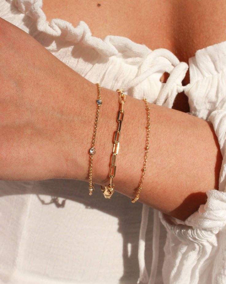 Brighten up your everyday stack with this delicate, gold-filled bracelet. Built to last, this tarnish-resistant bracelet won't lose its gold over time, guaranteeing your look is always polished! • Single Satellite Bracelet• Gold Filled• Chain Length Options: 5"-8"• Bracelet has the option to add a 1" extender to make adjustable Satellite Bracelet, Everyday Gold Jewelry, Everyday Jewelry Gold, Paperclip Bracelet, Everyday Wear Jewelry, Bracelet Stacks, Body Sweat, Normal Body, Steel Gifts