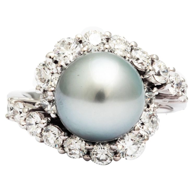 A Silver gray Tahitian pearl and white diamonds ring from the collection "Purity Di Perle" from FERRUCCI ., in a modern swirl design to compliment the delicate unique class of a sophisticated woman,Cherished as symbols of purity and perfection, elegance and affluence, Made in Italy Entirely made in 18k white gold, Size 6.75 Diamond total carat weight of 1.72 carat weight Silver Gray Tahitian Pearl 10.1 carat weight Diamond Pearl Ring, Tahitian Pearl Ring, Pearl Cocktail Ring, Pearl Wedding Ring, Victorian Engagement Rings, Tahitian Black Pearls, Pearl And Diamond Ring, Vintage Style Rings, White Diamond Ring