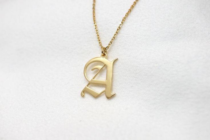 + Personalized Old English Initial Necklace + This initial necklace is a perfect gift for any occasion. * Letters : approx. 15 mm depending on the letter * Chain : Select the option from 1st drop down menu * silver / 18k gold plated / 18k rose gold plated * individually gift wrapped If you would like to see more name necklaces on my shop please go to below link! https://www.etsy.com/shop/TwilleyStreet?ref=seller-platform-mcnav&search_query=name+necklace If you would like to see choker neckla Dainty Monogram Name Necklace For Personalized Gift, Elegant Mother's Day Initial Necklace With Name, Elegant Mother's Day Initial Necklace, Elegant Custom Name Charm Necklaces For Anniversary, Elegant Custom Name Charm Necklace For Anniversary, Anniversary Initial Pendant Necklace With Custom Name, 14k Gold Personalized Initial Necklace, Personalized 14k Gold Initial Necklace As Gift, Classic Personalized Initial Necklace For Mother's Day