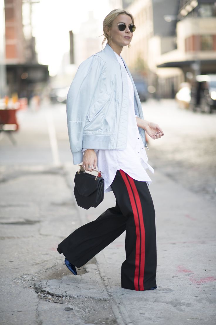 Stylish Ways to Wear Track Pants | POPSUGAR Fashion White Track Pants Outfit, How To Style Track Pants, Trackpant Outfit, Track Pants Outfit Women, Stripped Pants Outfit, Adidas Track Pants Outfit, Mama Outfits, Adidas Pants Outfit, Pant Outfits For Women