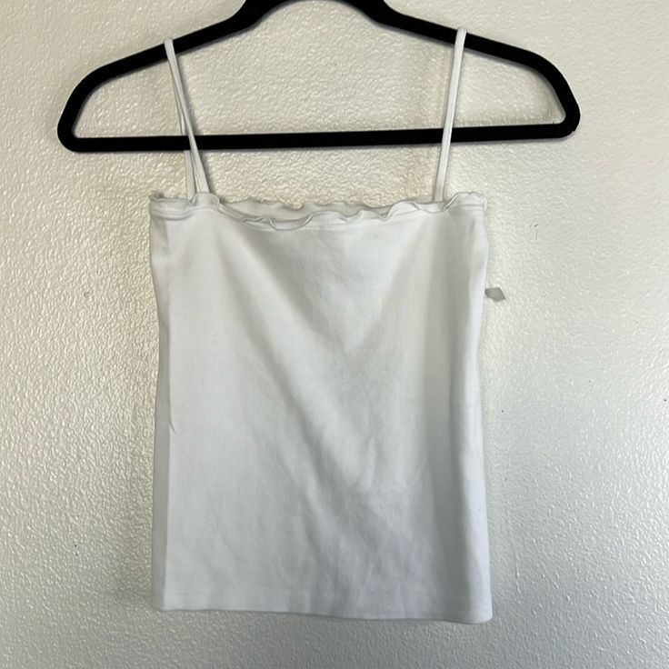 Nwot Brandy Melville White Camisole Os , No Flaws Noted Stretchy Approx. Measurements Length 19.5in P2p 13in Fitted Casual Camisole For Daywear, Fitted Tank Strap Tops For Daywear, Fitted Tops With Tank Straps For Daywear, Fitted Cotton Camisole For Daywear, Fitted Cotton Cami Tank Top, Fitted Tank Top For Daywear, Fitted Tank Tops For Day, Fitted Top With Adjustable Straps For Daywear, Fitted Camisole For Daywear