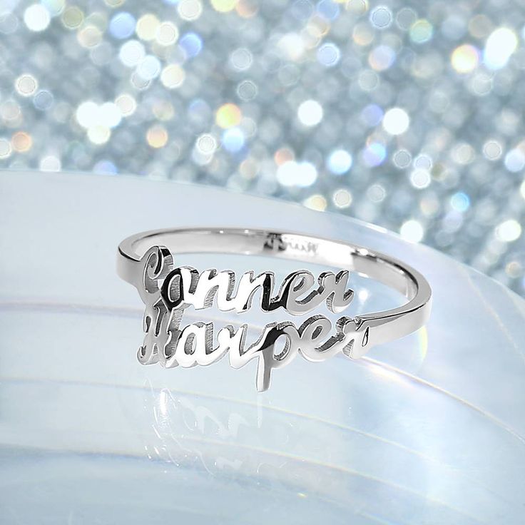 a silver ring with the words'come to harper'written on it in cursive writing