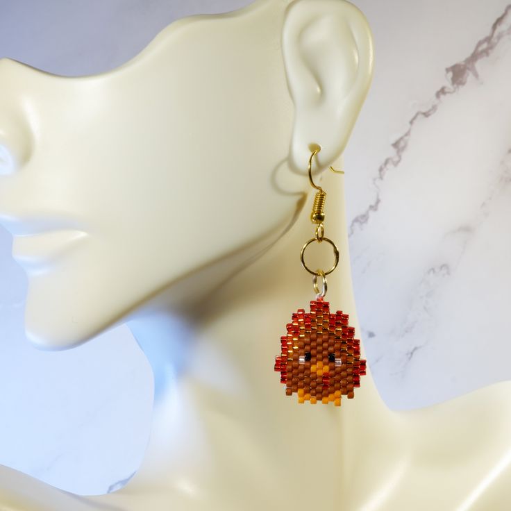 Celebrate Thanksgiving with these *Adorable* Turkey beaded earrings! Cute and festive, these super lightweight earrings are the perfect addition to your dinner wardrobe! Please note that colors may differ slightly depending on your screen. This pair of earrings is made-to-order. Please allow 3-5 business days for processing. *** Design Copyright to BeadCrumbs https://www.beadcrumbshawaii.com/ *** Orange Beaded Earrings As A Gift, Round Beaded Earrings For Gifts, Round Beaded Earrings As Gift, Beaded Dangle Earrings For Gift, Beaded Drop Earrings For Gift, Dangle Beaded Earrings For Pierced Ears, Dangle Beaded Earrings For Pierced Ears Gift, Drop Earrings With Dangling Beads As Gift, Colorful Beaded Dangle Earrings For Gift