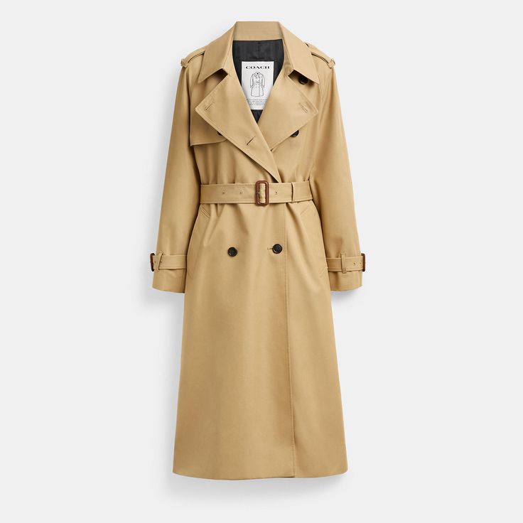 A modern update to a timeless silhouette this lightweight cotton-blend trench is designed with a relaxed fit for easy comfortable wear. Featuring our Heritage C Plaque at the epaulettes and leather buckles for an iconic Coach touch the double-breasted topper is finished with a storm flap an adjustable belt at the waist belted cuffs and a back vent for ease of movement. | Coach Relaxed Trench - Women's Size Medium - Khaki Timeless Gabardine Outerwear For Spring, Timeless Spring Outerwear With Double Button Closure, Timeless Belted Outerwear For Spring, Classic Coach Outerwear For Fall, Coach Casual Spring Outerwear, Casual Coach Outerwear For Work, Casual Coach Outerwear, Chic Coach Spring Outerwear, A Storm