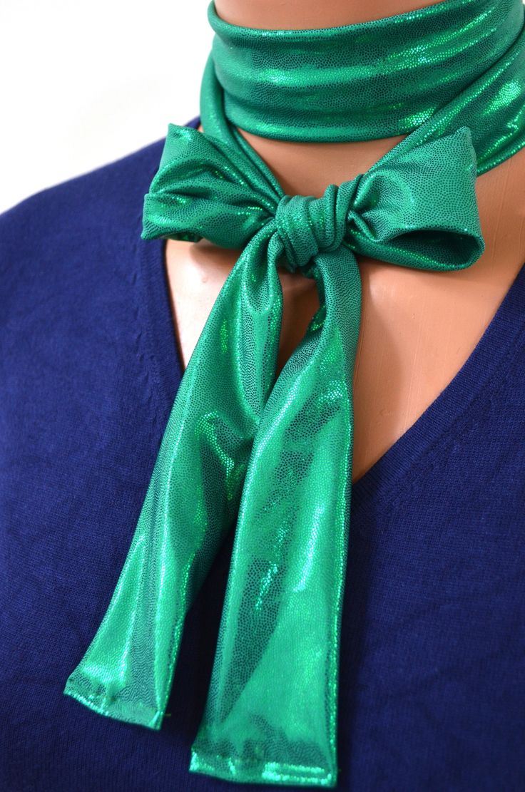 This is a sweet tie that can be used as a bow, a necktie, a scarf, or a hair tie. It is super festive in metallic green, and will add a little flair to a plain shirt. It is made from polyester, with a hint of spandex for wonderful durability. Easy care! Machine wash, line dry. This listing is for the tie only. Green Adjustable Tie For Party, Adjustable Green Ties For Party, Adjustable Green Tie For Party, Green Standard Tie For Parties, Green Standard Tie For Party, Party Neckwear With Tie Neck Detail, Women's Neck Ties, Christmas Necktie, Outdoorsman Gifts